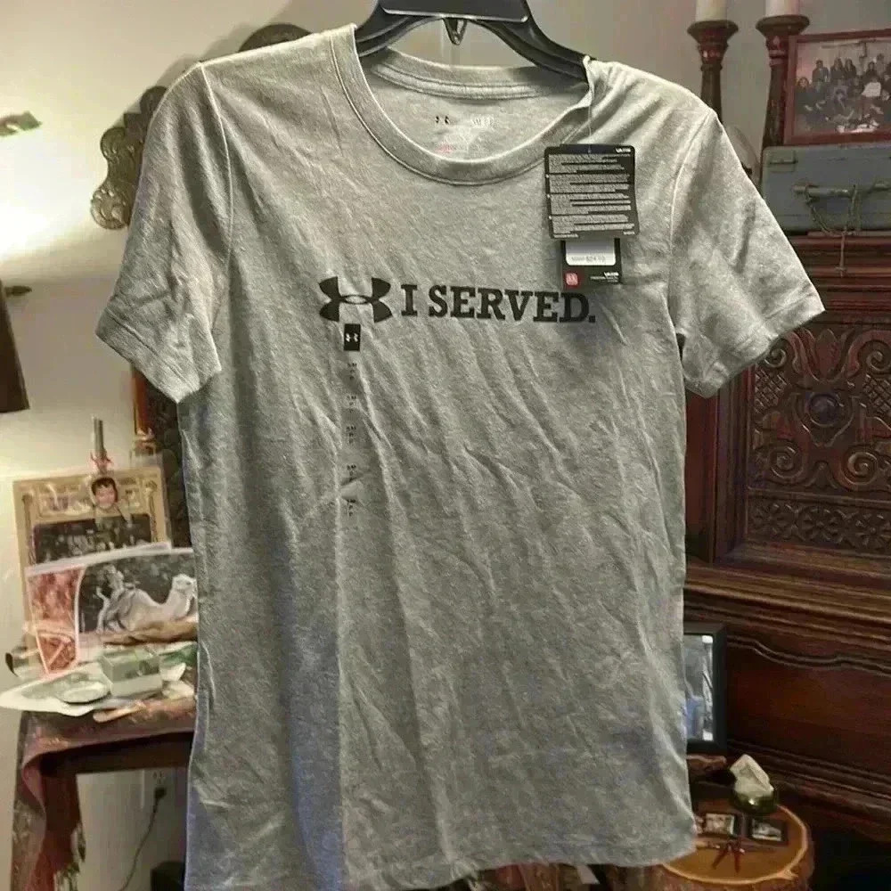 Women’s or men’s small petite under armor I served T-shirt